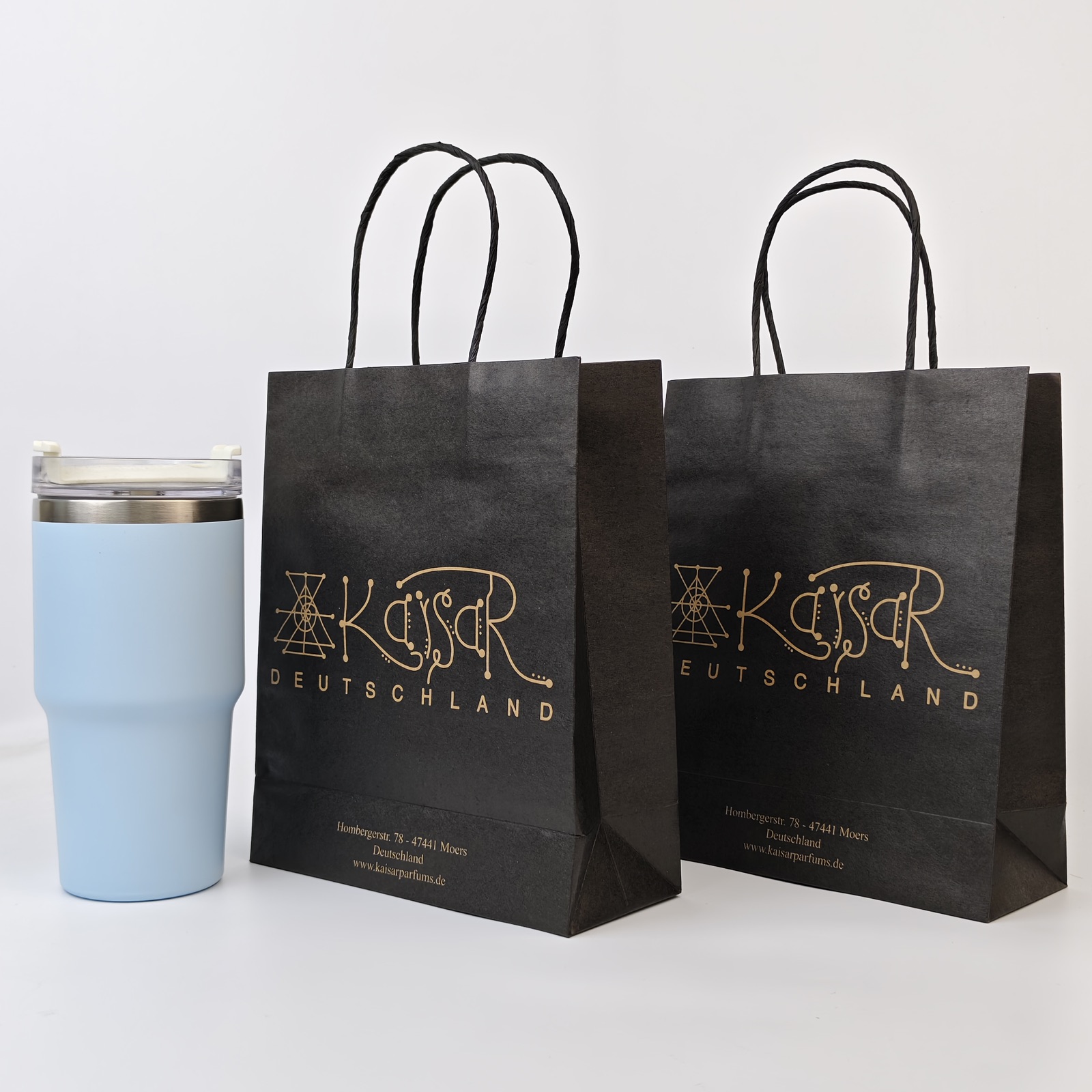 black kraft paper shopping bag with metallic print and twisted handles - view 4