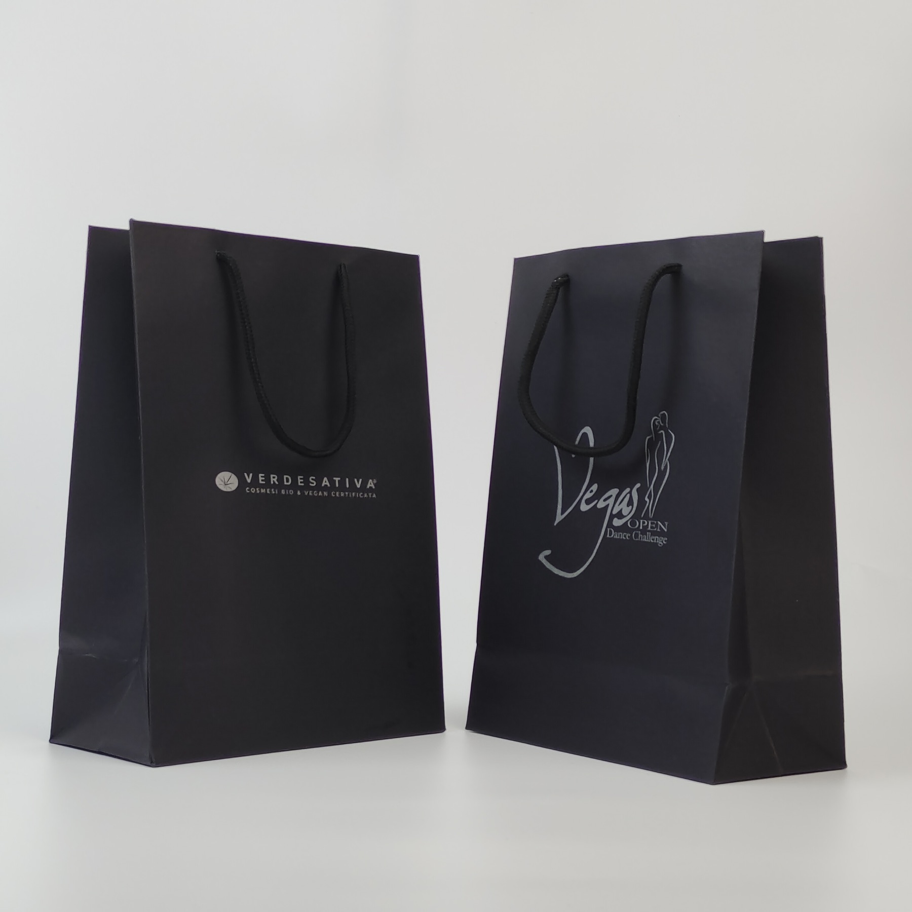 black paper carrier bag with silver logo and reinforced top - view 2