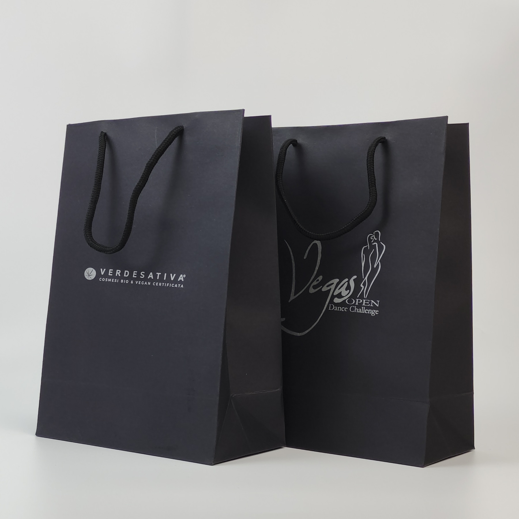 black paper carrier bag with silver logo and reinforced top - view 4