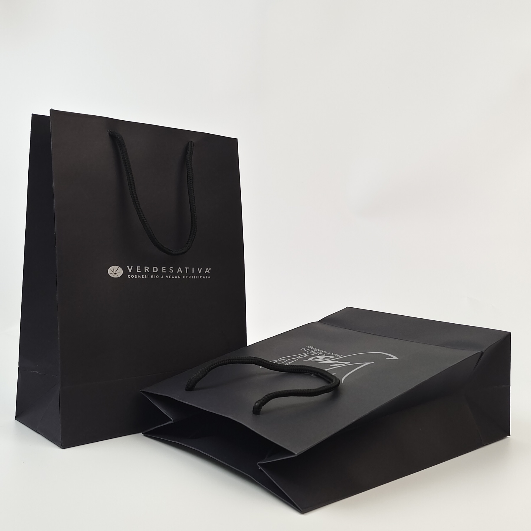 black paper carrier bag with silver logo and reinforced top - view 6