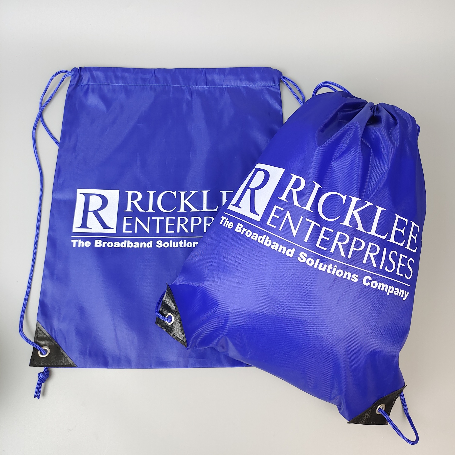 blue polyester drawstring backpack with single-color screen printed logo - view 2