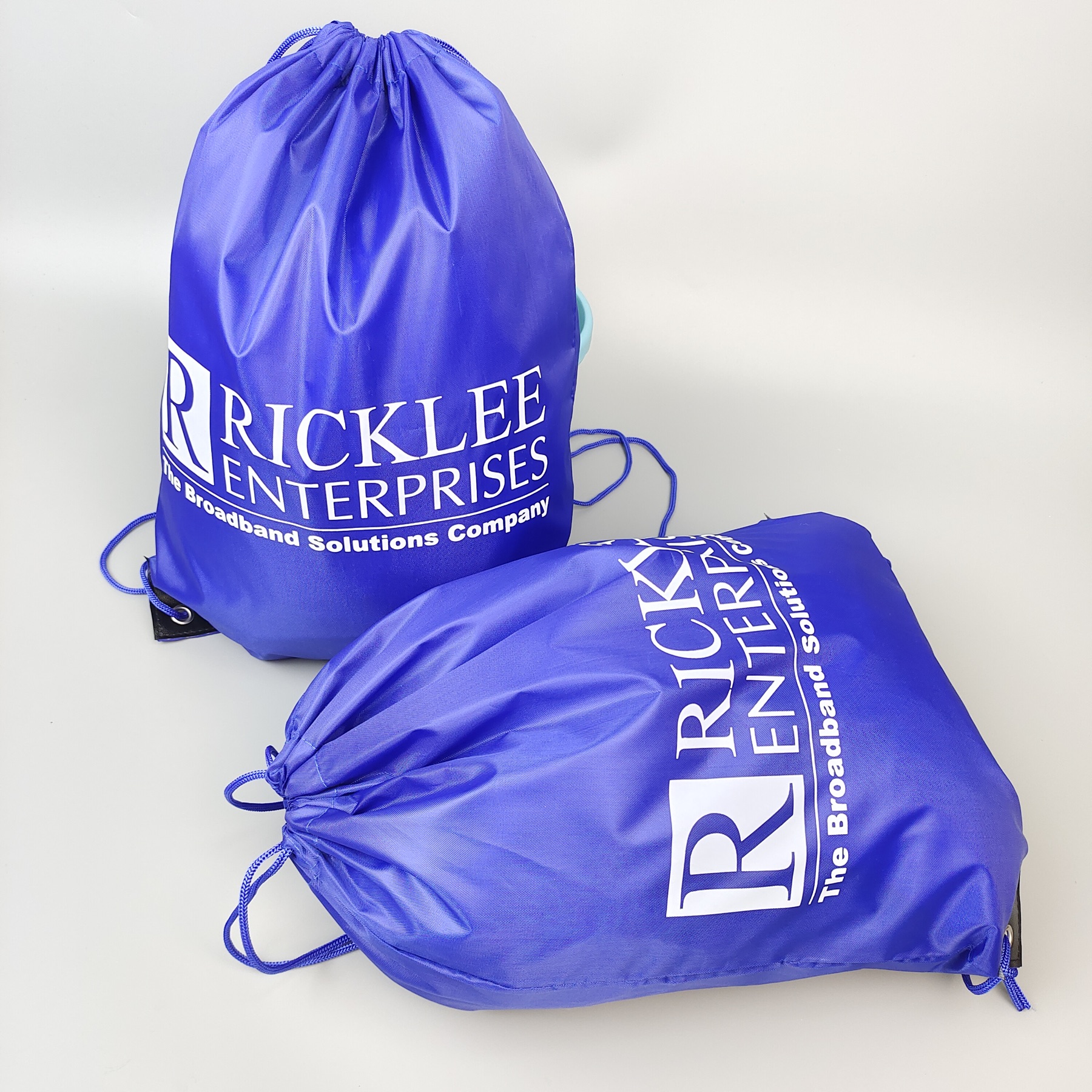 blue polyester drawstring backpack with single-color screen printed logo - view 3