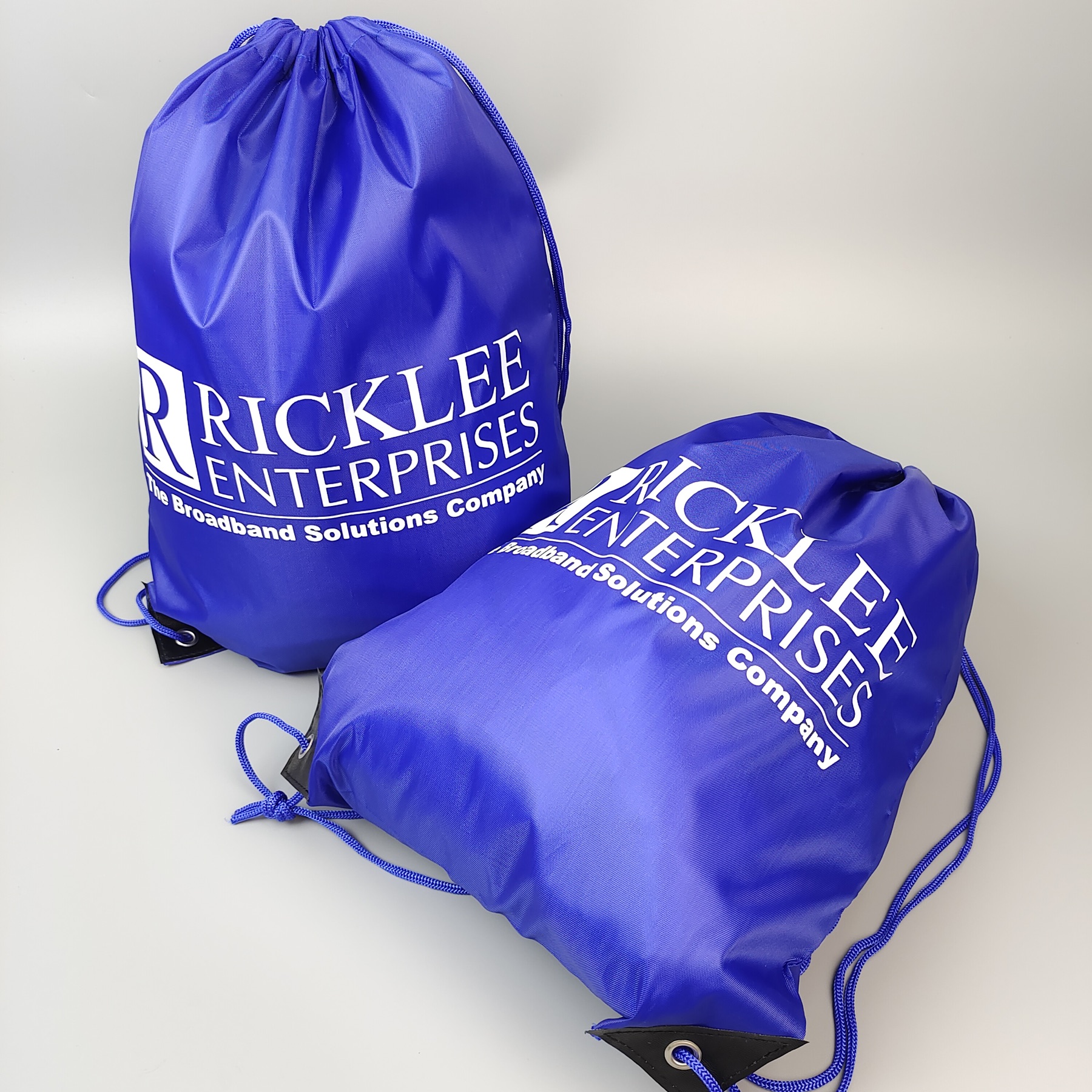 blue polyester drawstring backpack with single-color screen printed logo - view 4