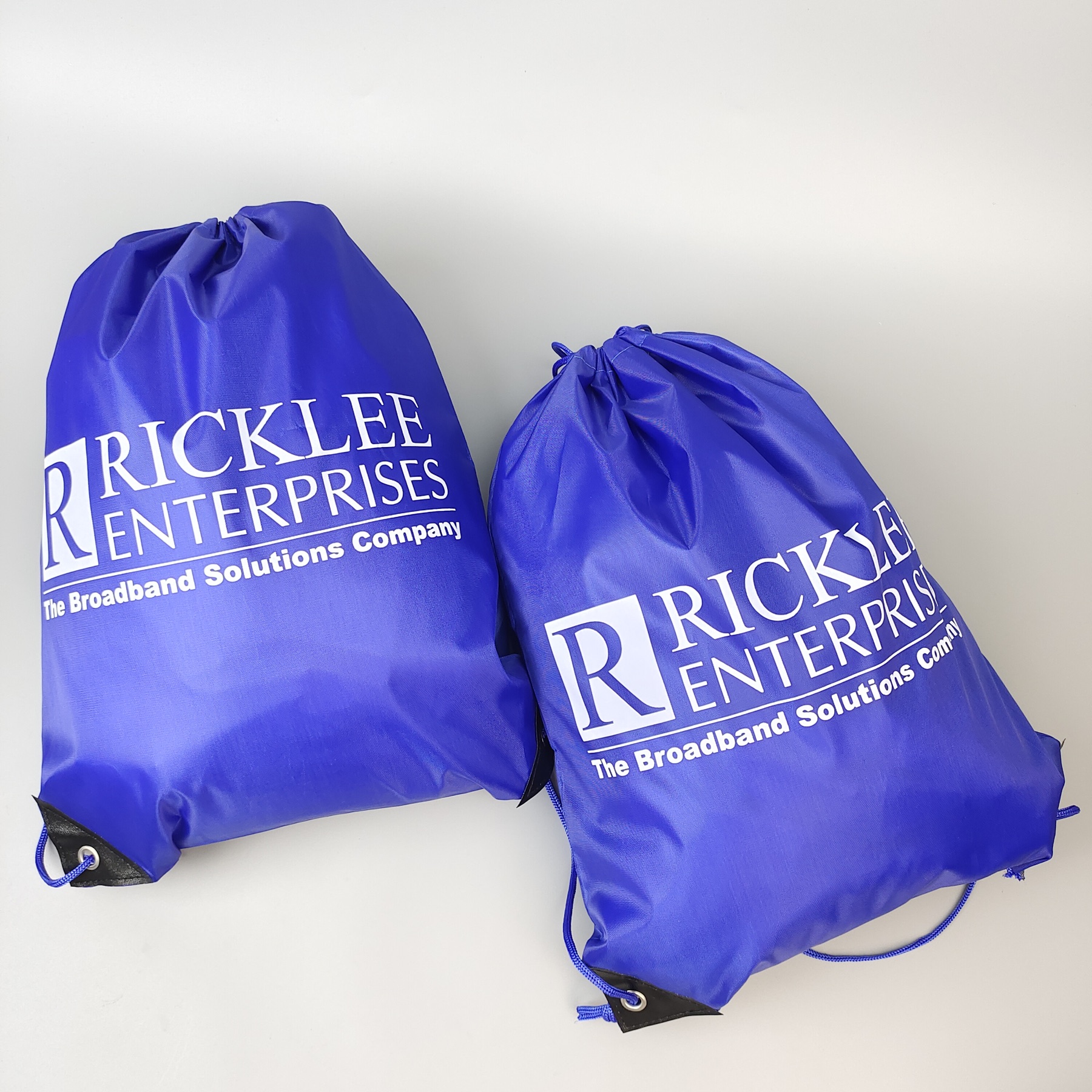 blue polyester drawstring backpack with single-color screen printed logo - view 5