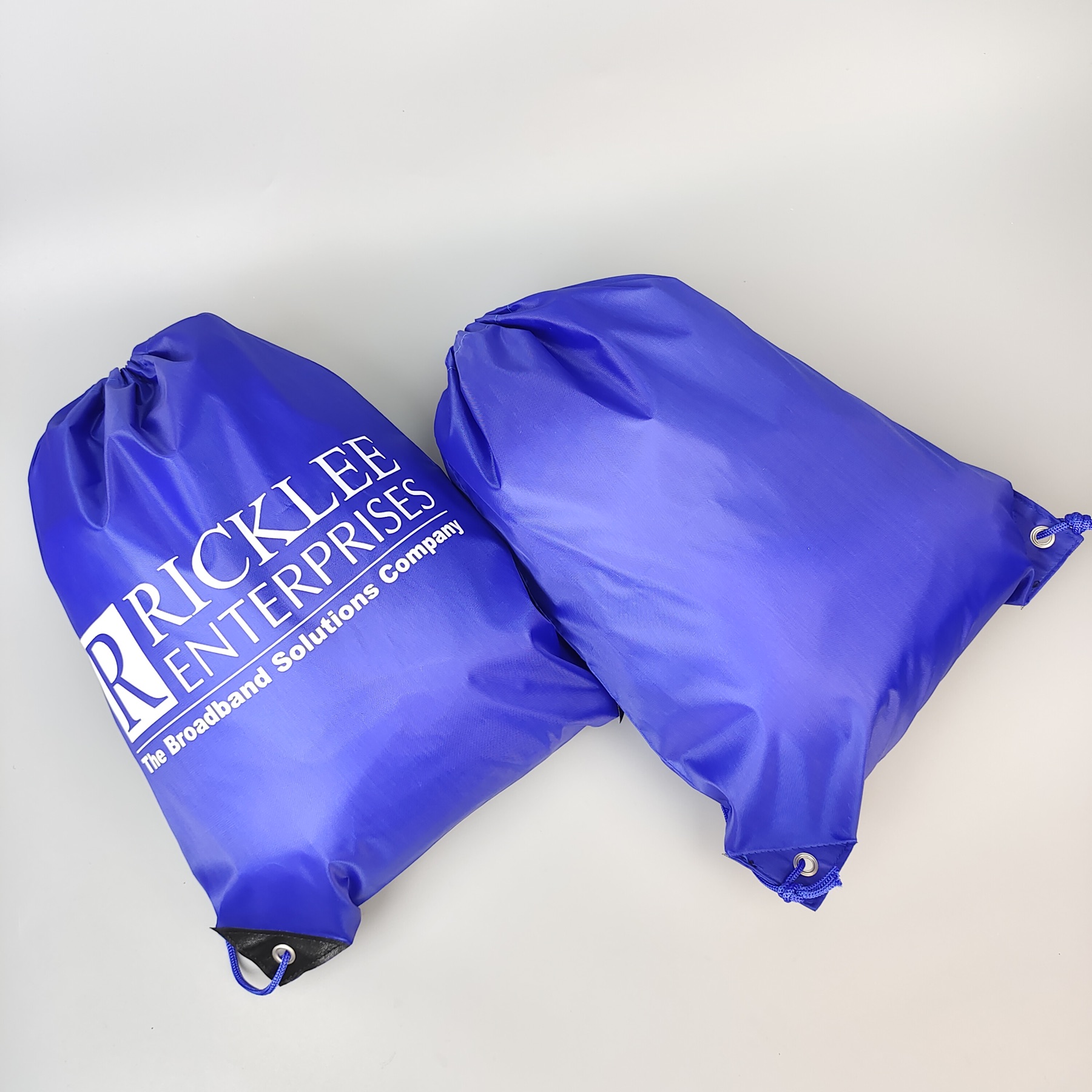 blue polyester drawstring backpack with single-color screen printed logo - view 6