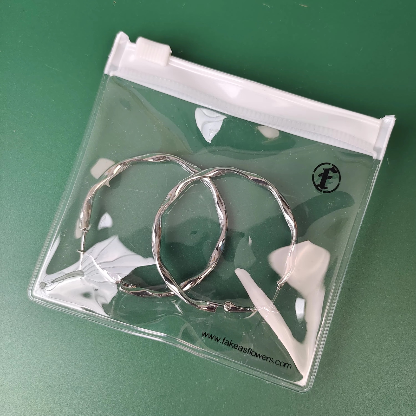 clear PVC jewelry pouches with white zipper and printed black logo - view 5