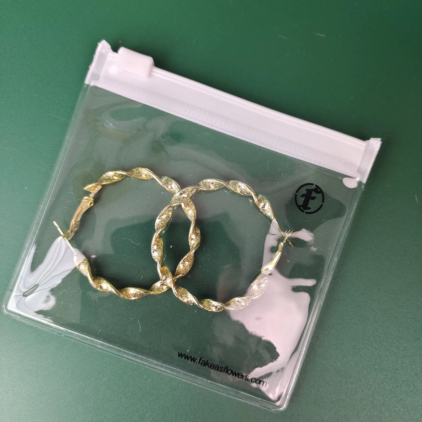 clear PVC jewelry pouches with white zipper and printed black logo - view 6