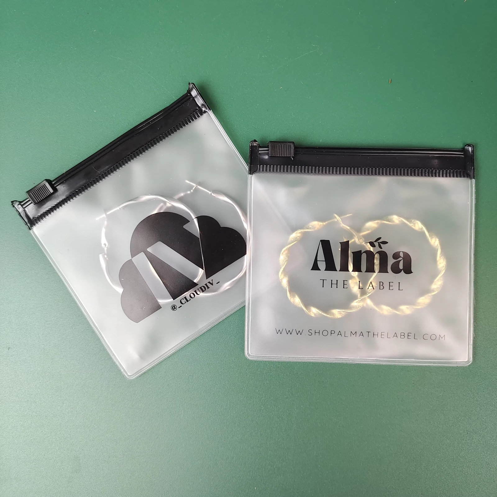 frosted PVC ring pull pouch containing jewelry and hair accessories - view 5