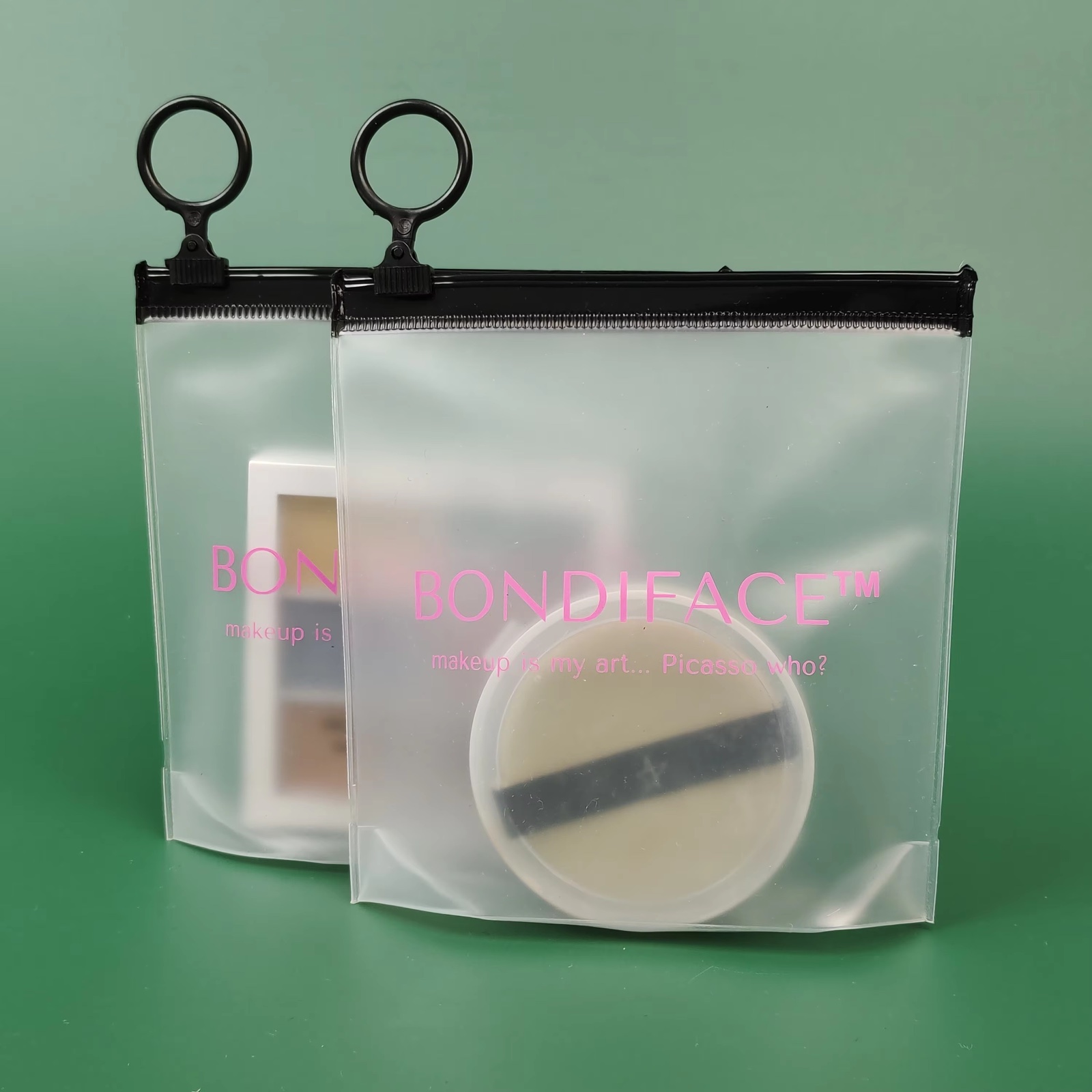 frosted PVC makeup pouches with pink logo and black ring pulls - view 3
