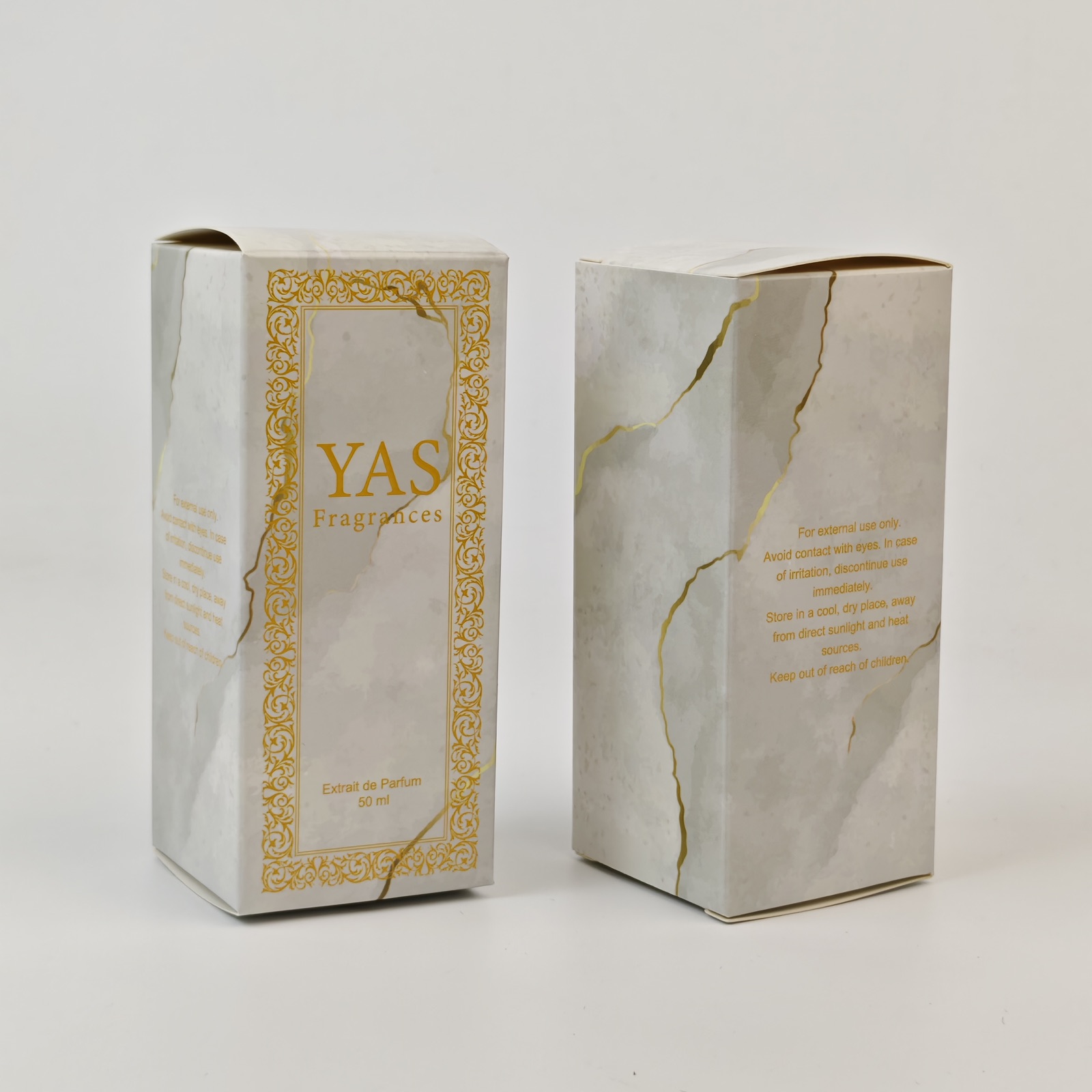 marble effect perfume folding carton with metallic gold details - view 3