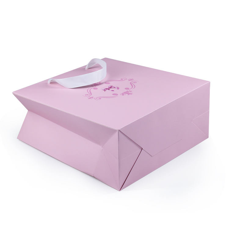 pink printed paper shopping bag for baby clothing and gifts - view 3