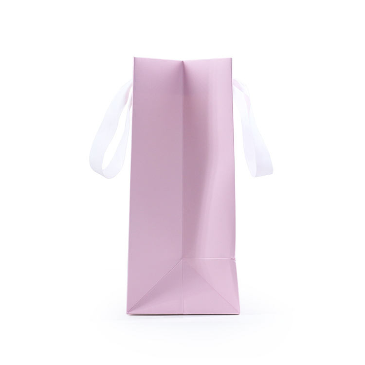 pink printed paper shopping bag for baby clothing and gifts - view 4
