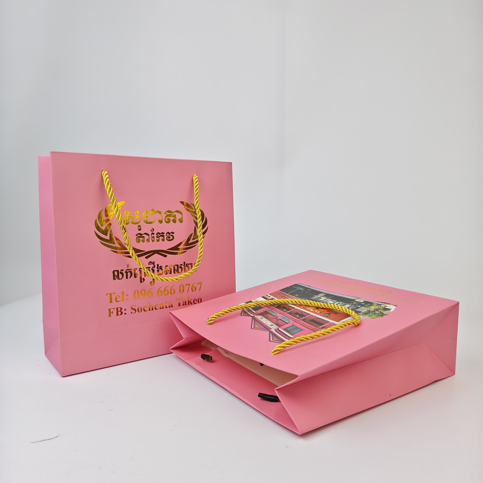 pink paper gift bag with metallic foil artwork and rope handles - view 4