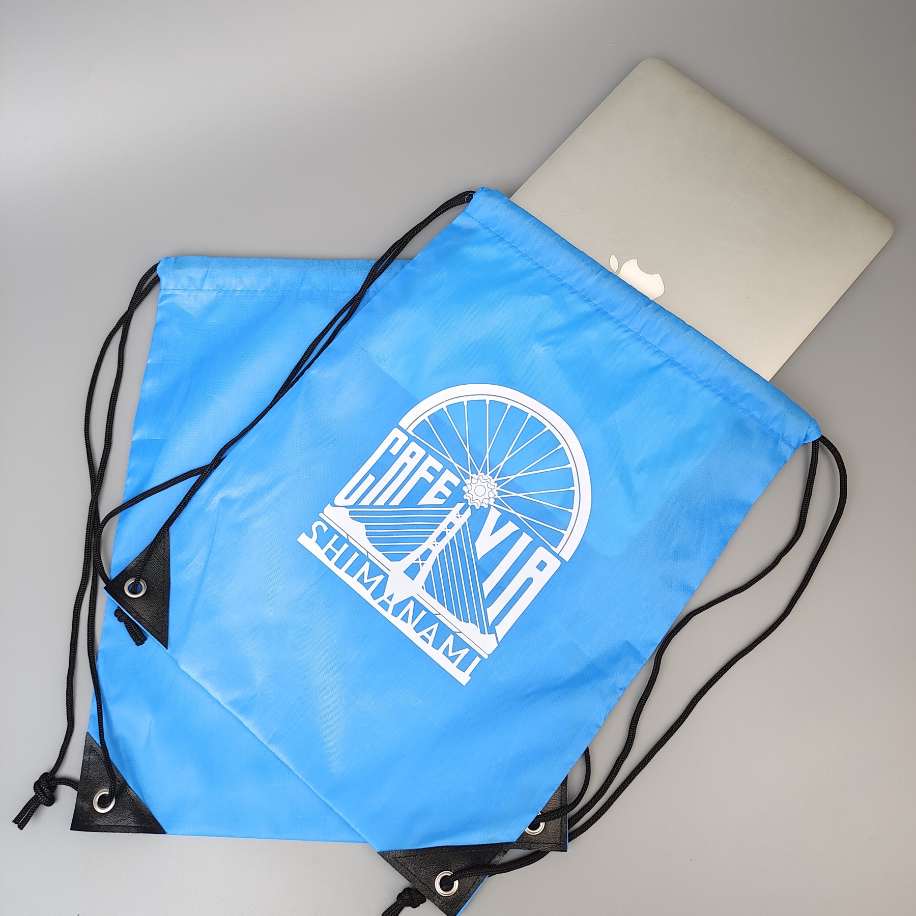 sky blue polyester drawstring backpack with screen printed artwork - view 4