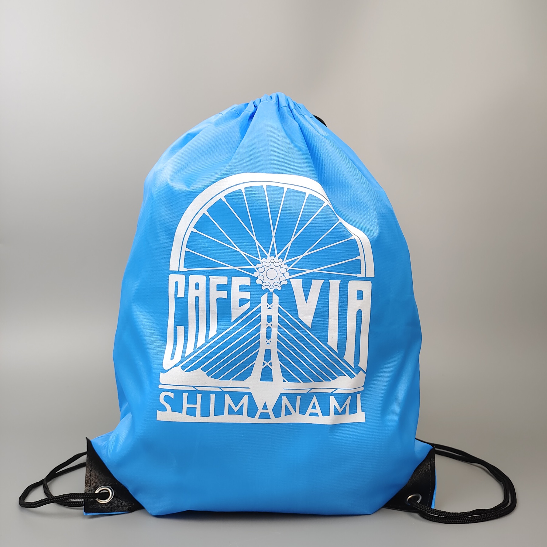 sky blue polyester drawstring backpack with screen printed artwork - view 6